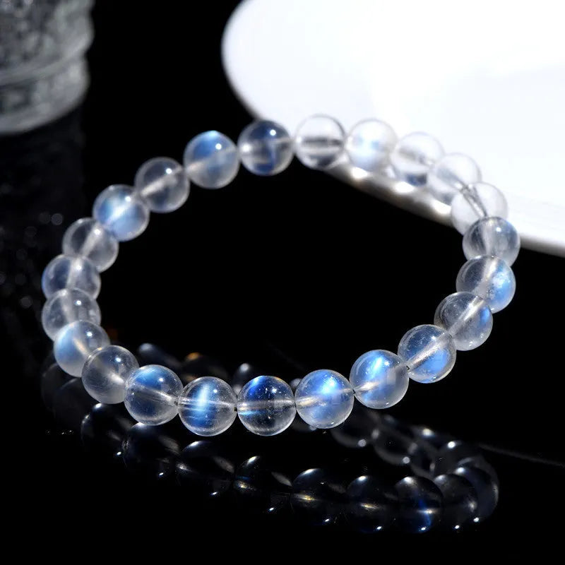 Natural cream body blue moonlight crystal bracelet with smooth ground beads in unisex simple design