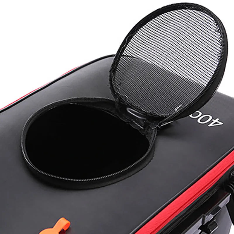 Collapsible EVA portable fishing bag in black with nylon zipper, folded flat on a wooden table