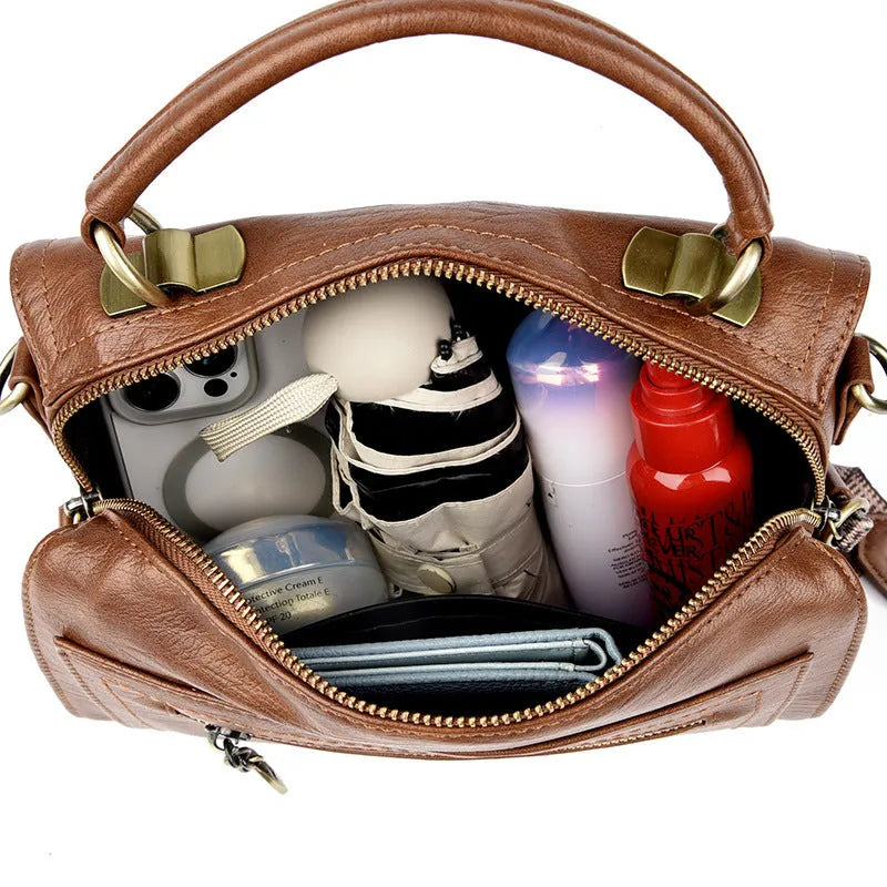 Soft grey PU women's crossbody bag with a horizontal square shape and sandwich pocket.
