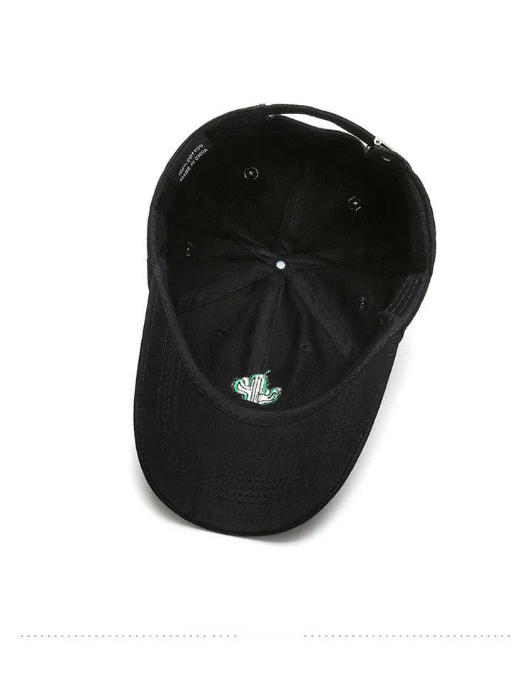 Embroidered cartoon pattern cotton baseball cap in black, white, and pink for men and women