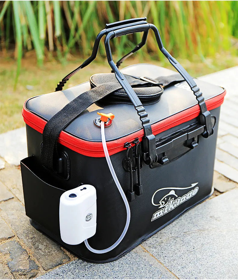 Collapsible EVA portable fishing bag in black with nylon zipper, folded flat on a wooden table