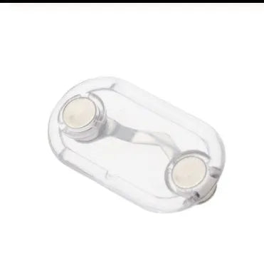 Black magnetic glasses holder attached to car dashboard with spectacles stored on bracket