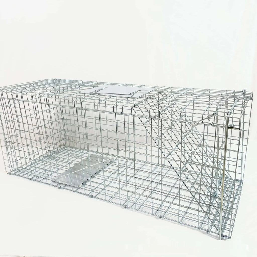 Fully automatic foldable cat trap cage galvanised steel 60x20x18cm with pedal mechanism on grass