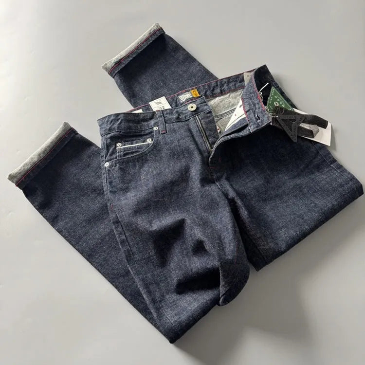Men's primary colour straight leg jeans in American retro style on a hanger