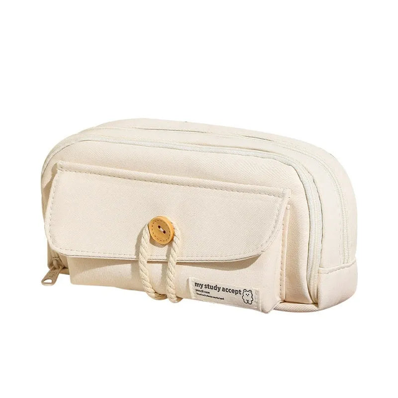 Green Korean-style canvas pencil case open, showing large capacity for pens and stationery.