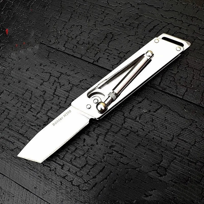 Heavy-duty folding stainless steel utility knife with neutral finish, closed position