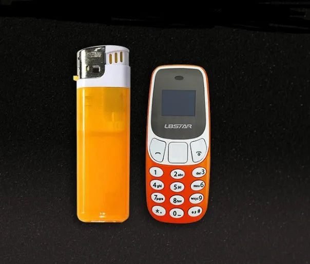 Ultra-small miniature thumb phone with 0.66-inch OLED display and keypad, smaller than a lighter