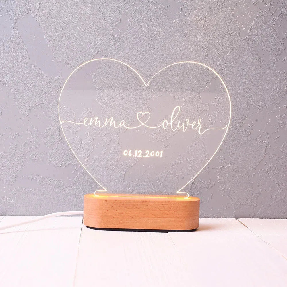 Custom LED night light with engraved names and date on transparent acrylic panel