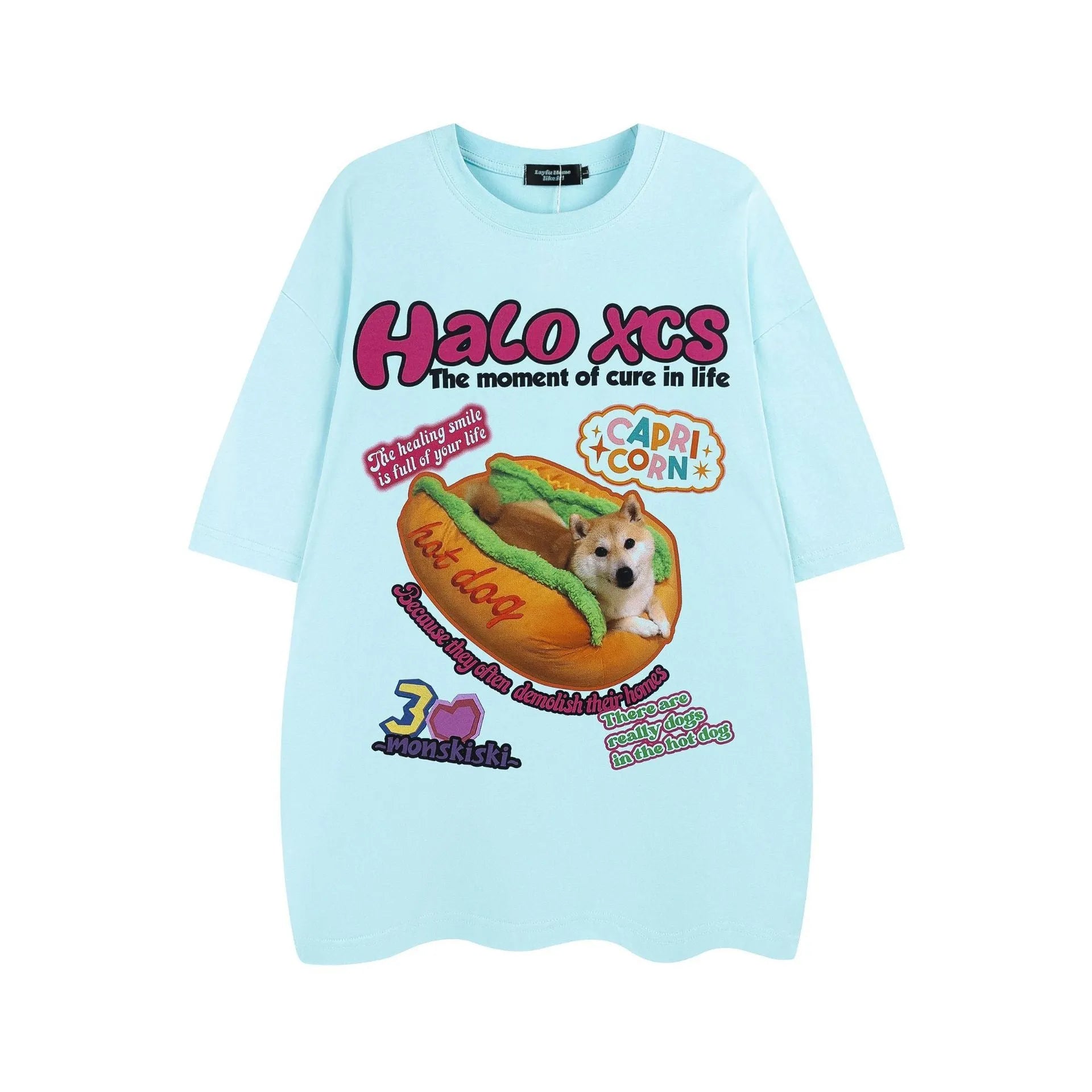 White cotton t-shirt with a cartoon print of a hamburger and a dog, showing a round neck and short sleeves.