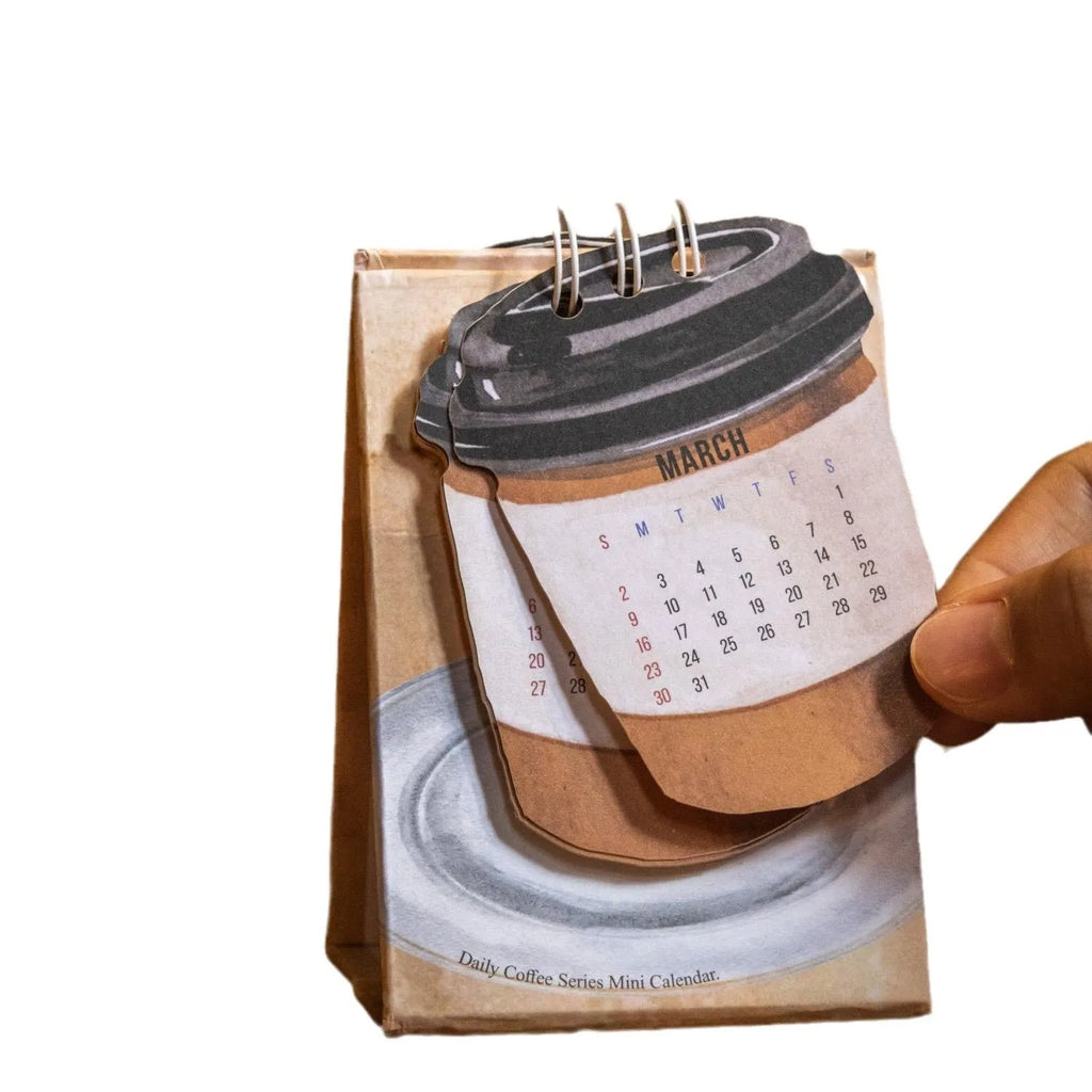 2025 mini desk calendar set showing ten different paper designs including Coffee Time and Life Is Not Easy.
