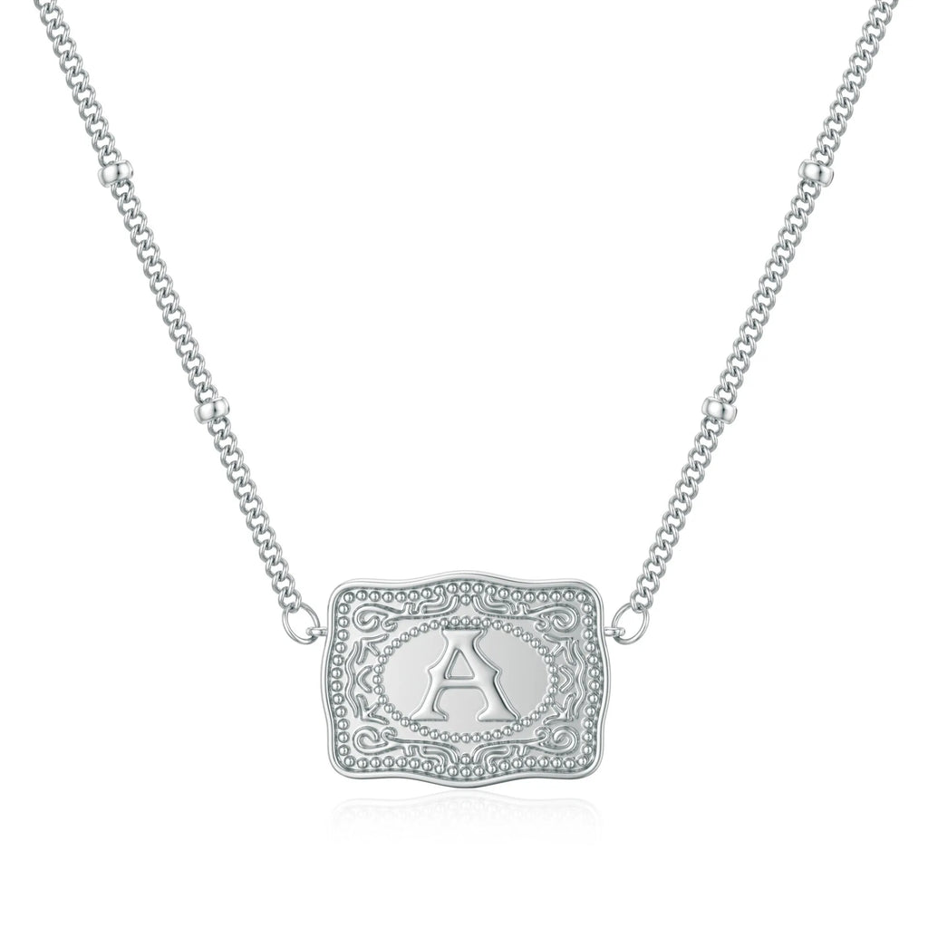 Copper letter necklace showing gold and white K electroplated finishes with alphabet charms