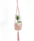 Hand-woven brown polyester cotton flower pot with net pocket cord holding a green plant.