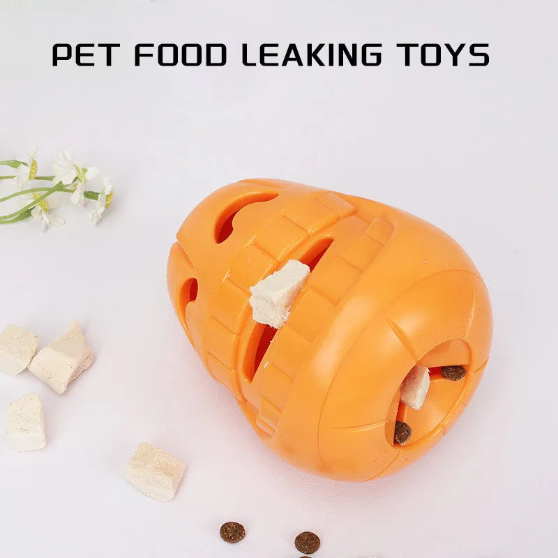 Halloween pumpkin shaped orange dog chew toy with treat-dispensing funnel opening