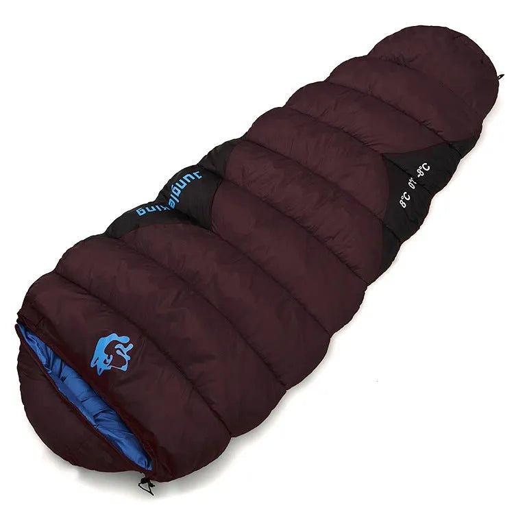 Outdoor cotton sleeping bag in Army Green, shown beside its grey compression storage sack.