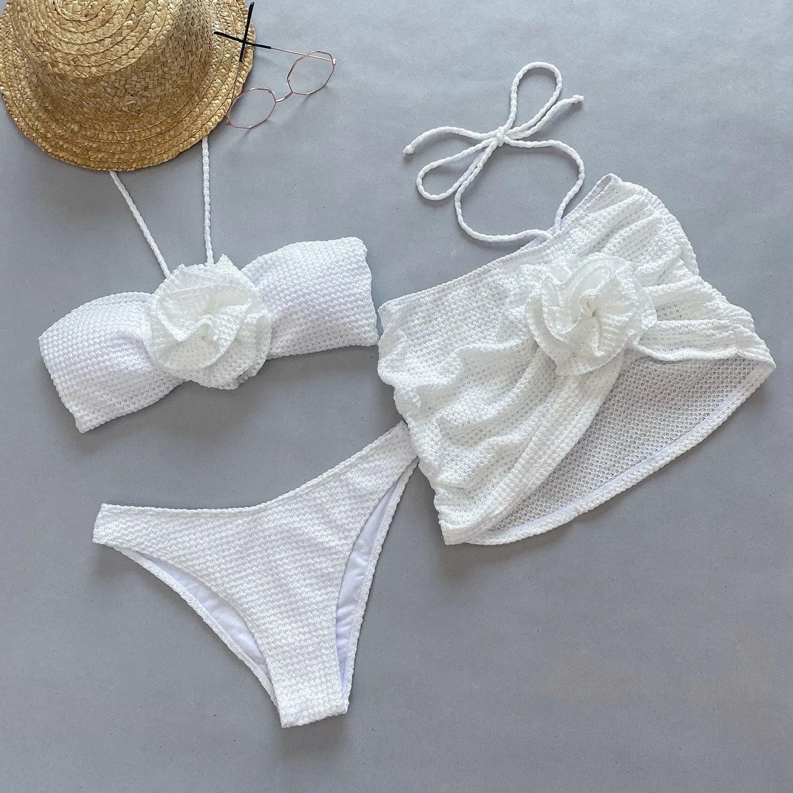 Women's purple and white three-piece bikini swimsuit with 3D flower split design