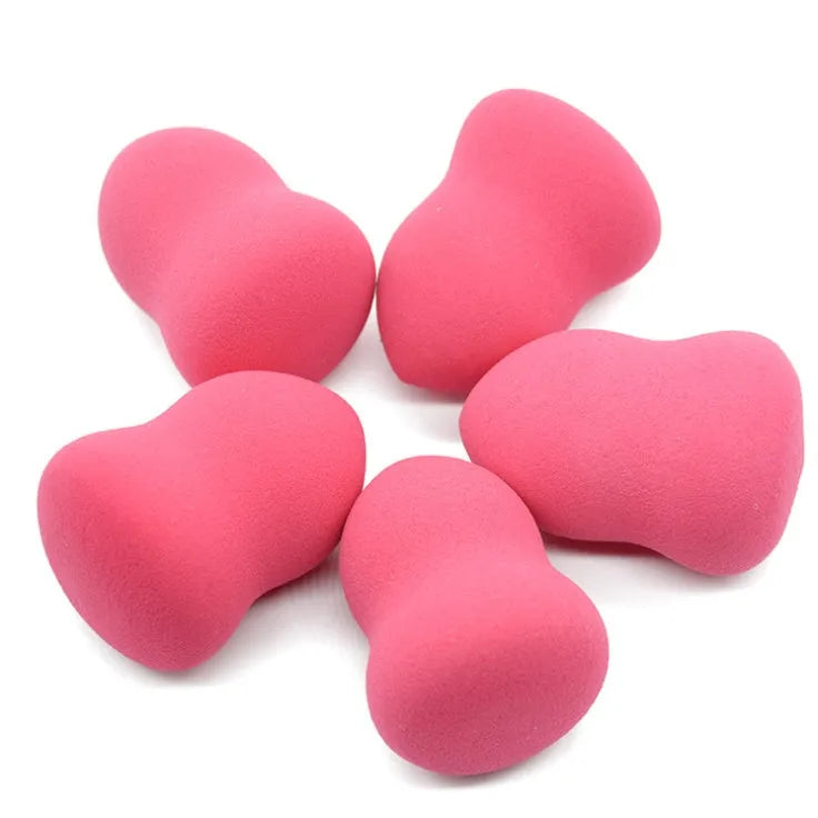 Pink makeup foundation sponge cosmetic puff with 4x4x5.6cm dimensions for wet or dry application