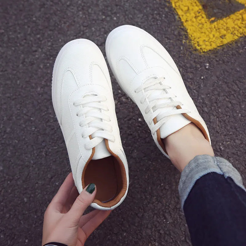 Women's solid leather platform shoes in white, side view, sizes 35-40