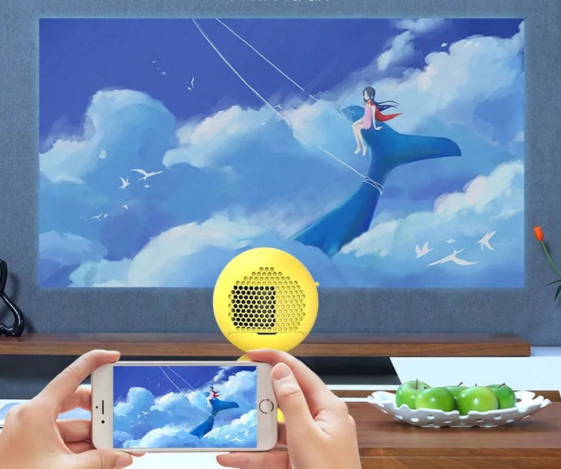 YG220 portable LED projector in white or yellow colour with front projection design