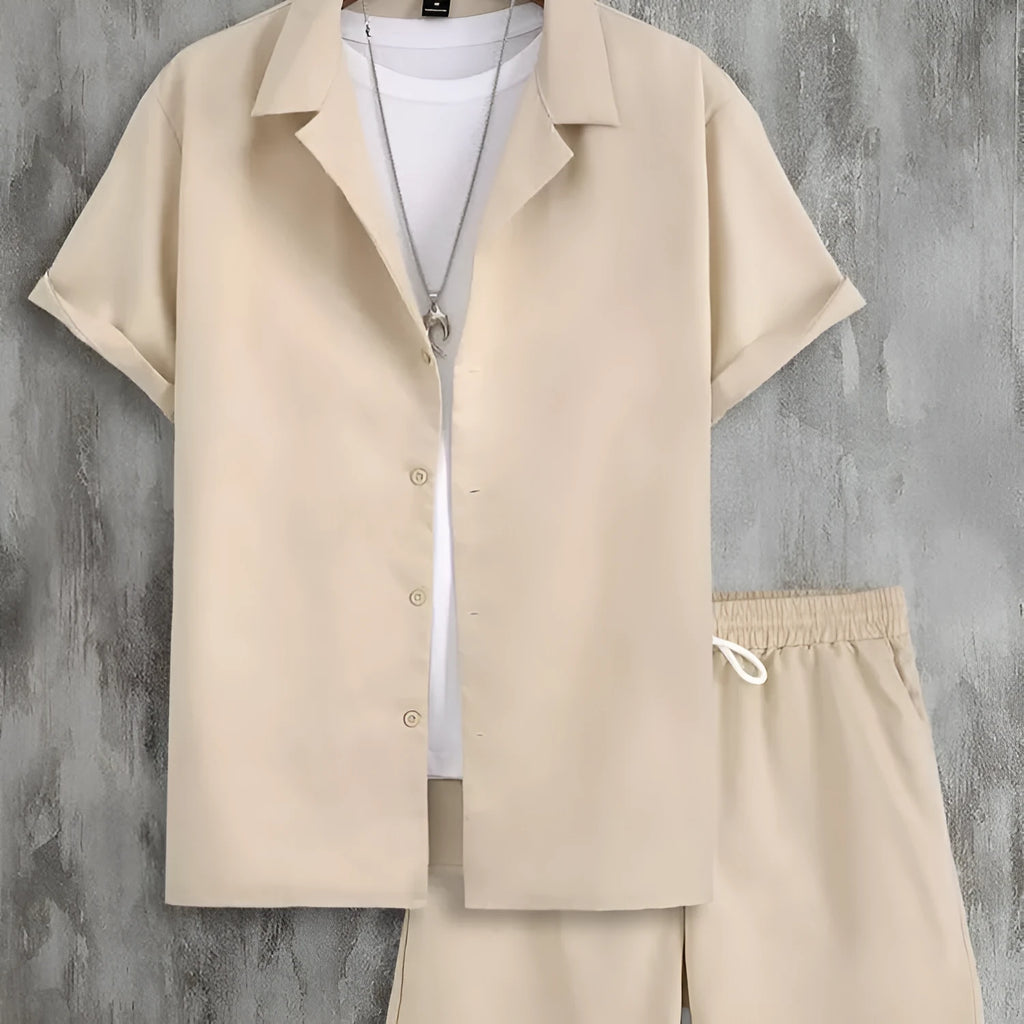 Man wearing a white short sleeve Cuban collar shirt and matching shorts from a lightweight polyester sport suit set.