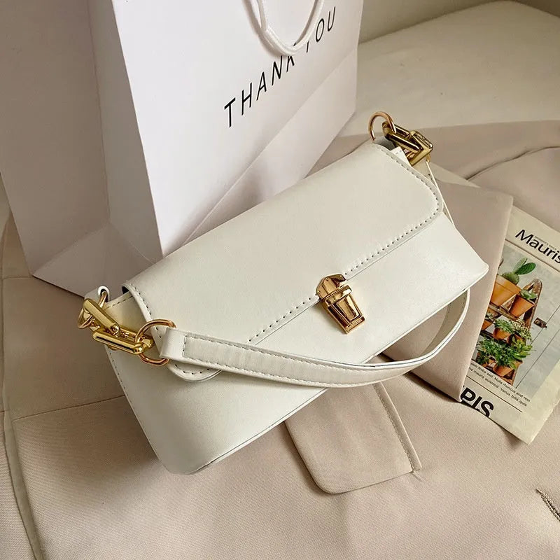 Brown PU leather underarm shoulder bag with square shape, sandwich pocket front and adjustable shoulder chain
