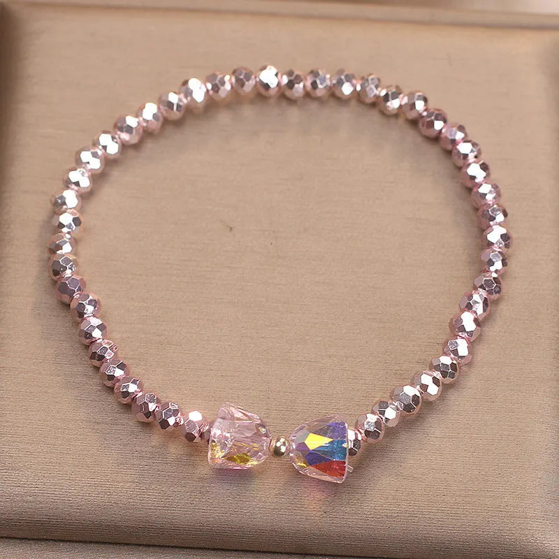 Colourful artificial crystal butterfly bracelet in blue, dark pink, and light pink, handcrafted with ethnic style for women