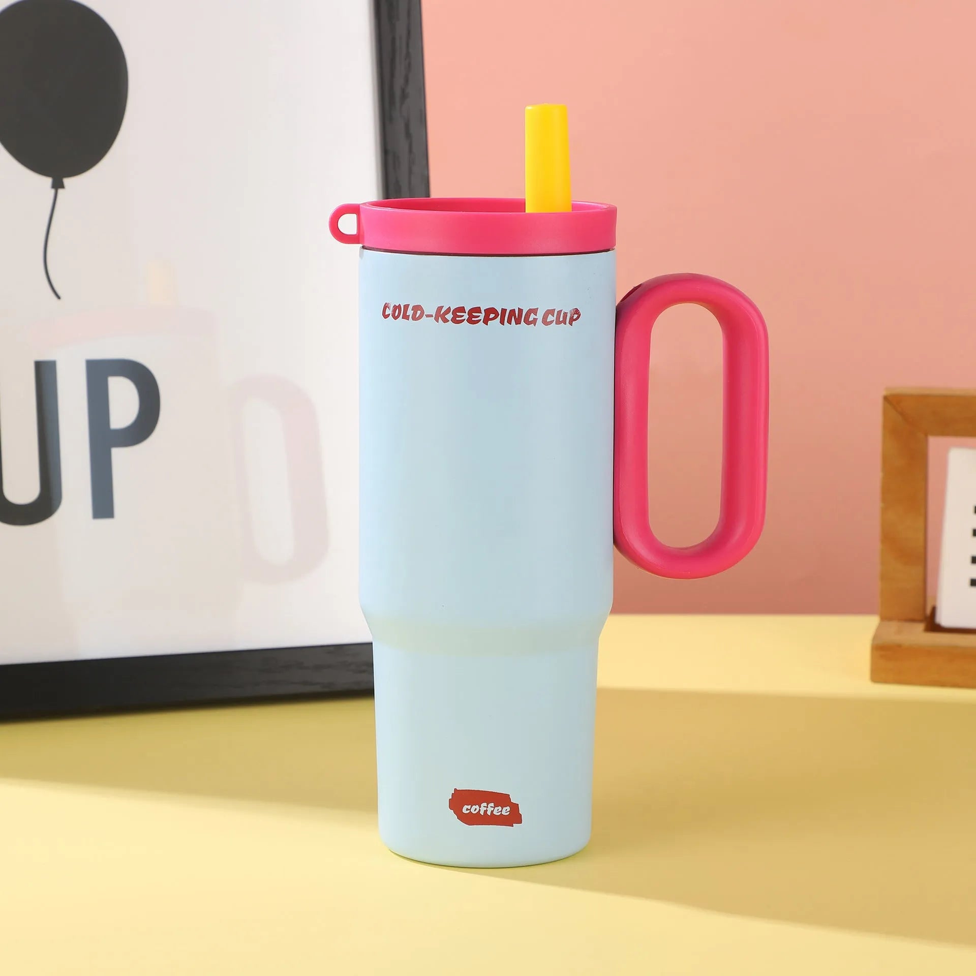 Large insulated straw cup with handle in multiple colour options showing temperature retention features