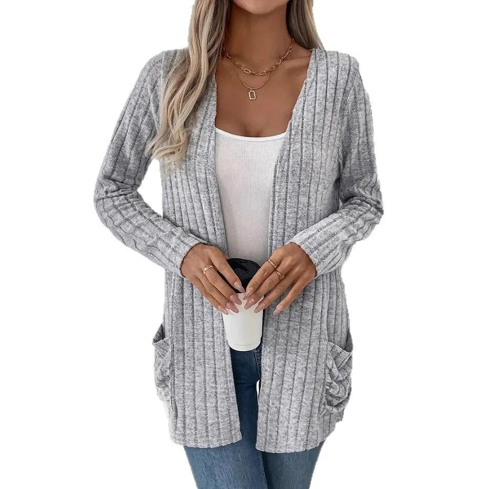 Solid colour long sleeve cardigan with pocket in loose fit, available in black or grandma grey