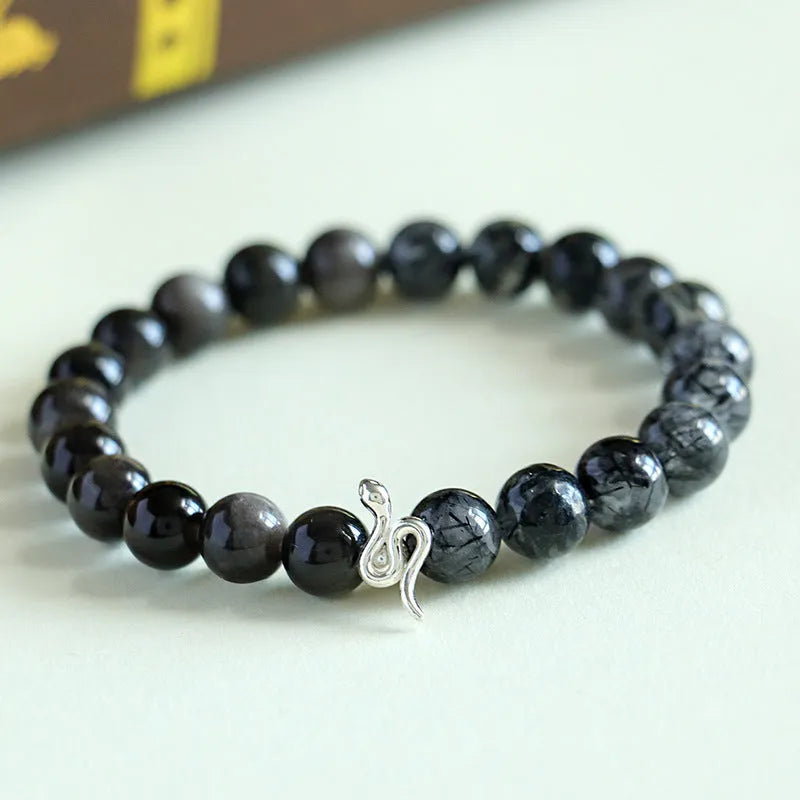 925 silver snake beaded bracelet with black hair crystal stone accents on white background