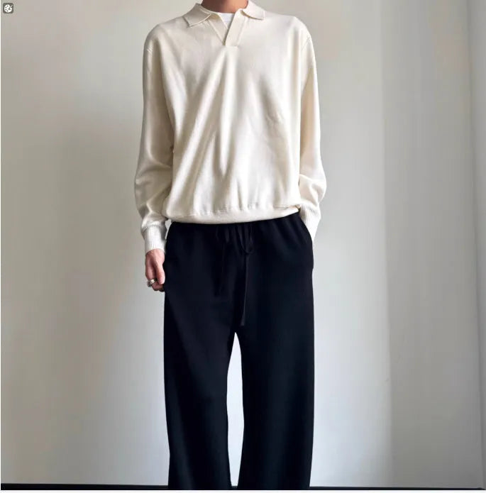 Old Money style pure wool polo sweater with lapel collar in loose fit, shown in navy blue colour.