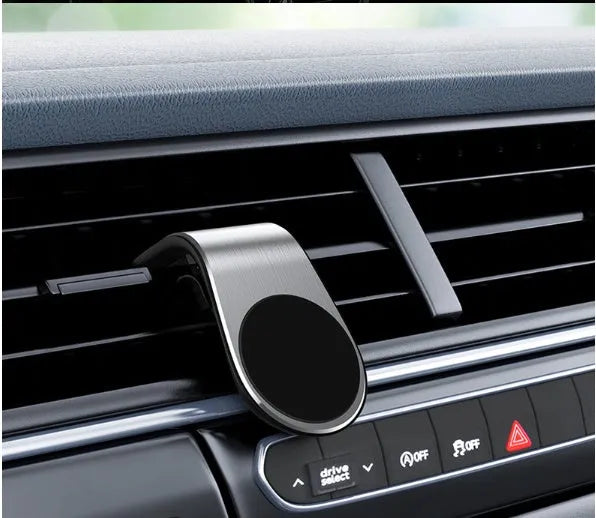 Car bracket phone holder with sticky gel pad in black mounted on car dashboard, universal fit for smartphones