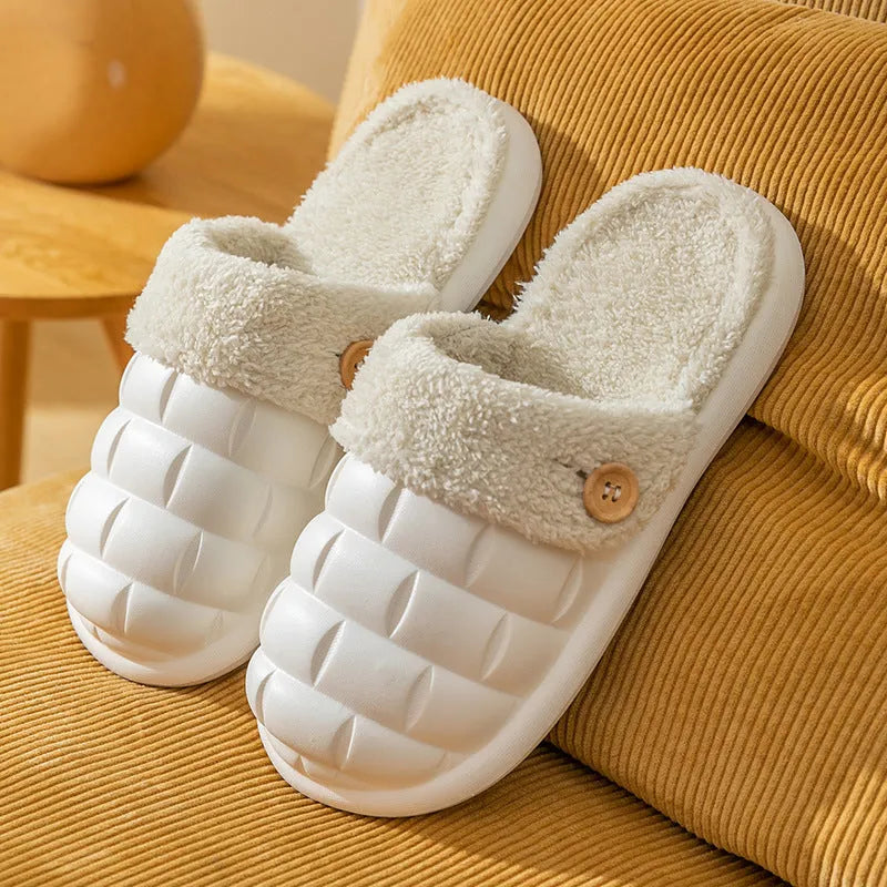 Plaid patterned EVA detachable slippers with plush lining, shown in pink, on a plain background.
