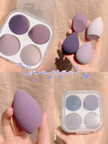 Makeup egg box containing four synthetic sponge beauty applicators in assorted colours including grape, mango, mint, and peach
