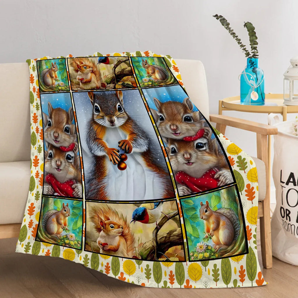 Yellow flannel blanket with white bellied squirrel print, 130x150cm, on a sofa