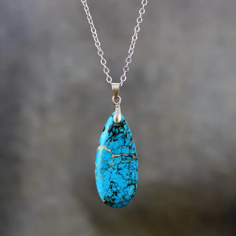 Emperor Stone jade pendant necklace with 18K gold plating, showing heart-shaped design in red silver finish.