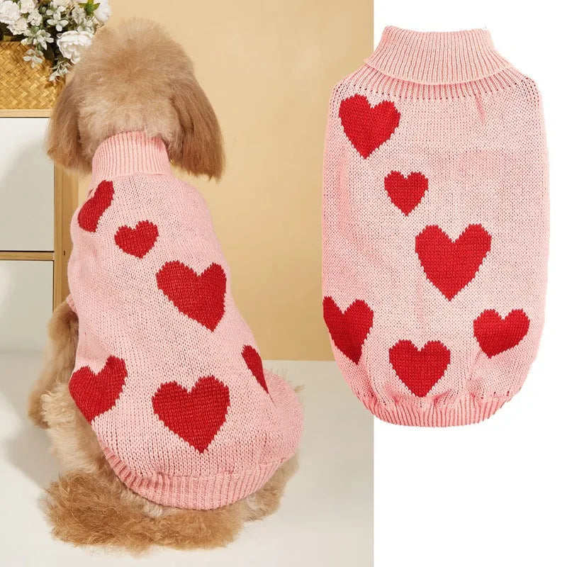 Pink knitted acrylic dog sweater for Valentine's Day, size M, on a small dog