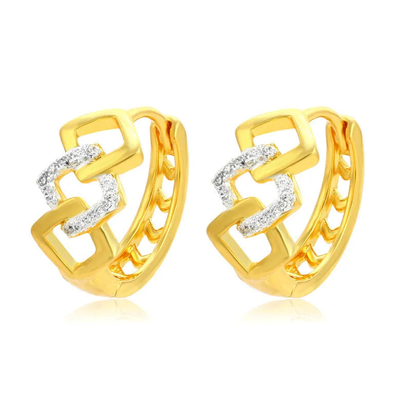 Gold electroplated geometric hollow-out earrings with ear clip fastening on white background