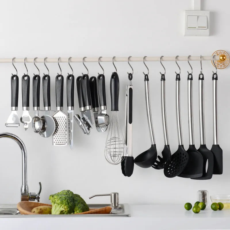 Black silicone kitchen spatula spoon set with stainless steel handles, 16-piece cooking utensil collection