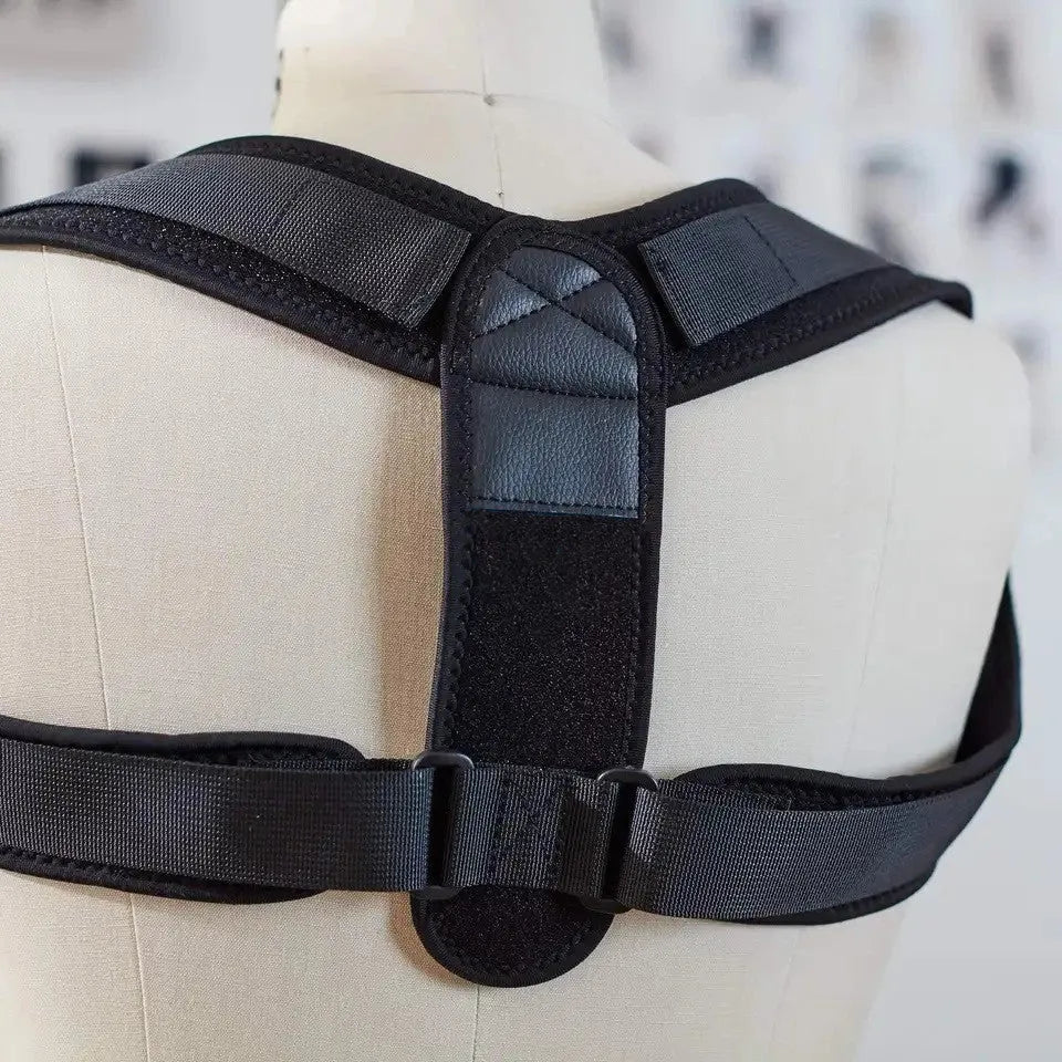 Black adjustable posture correction strap with elastic bands for back and shoulder support