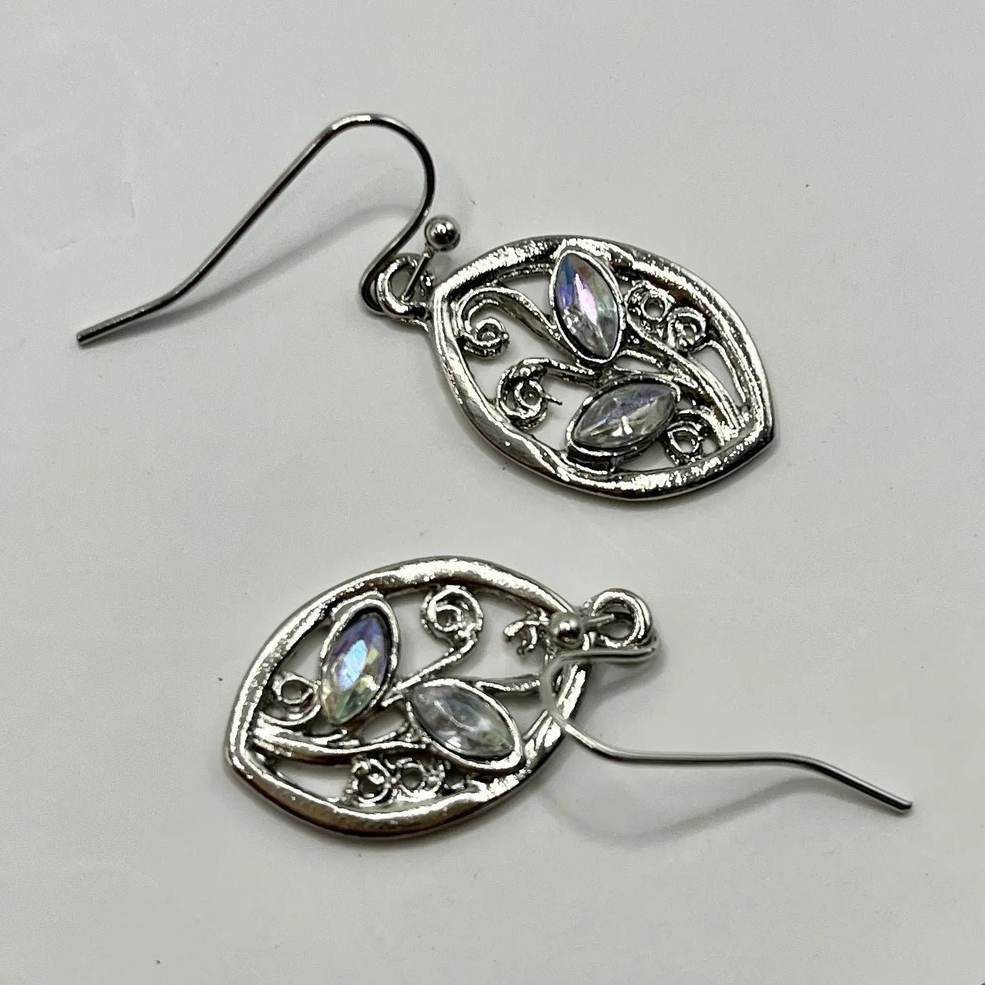 Silver colour women's earrings with creative leaves design embedding colourful moonstones