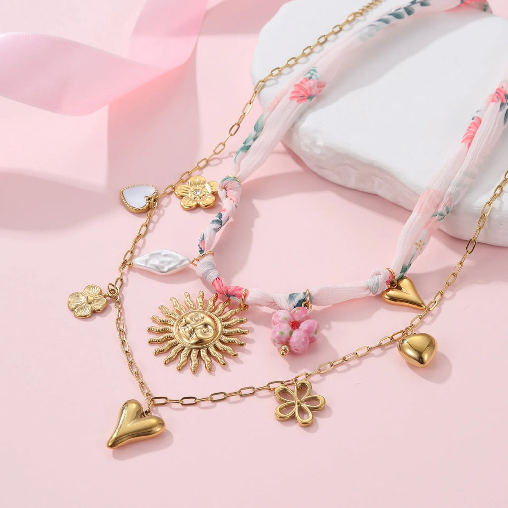 Women's stainless steel sun pendant necklace with 18K electroplating on adjustable 41-50cm chain