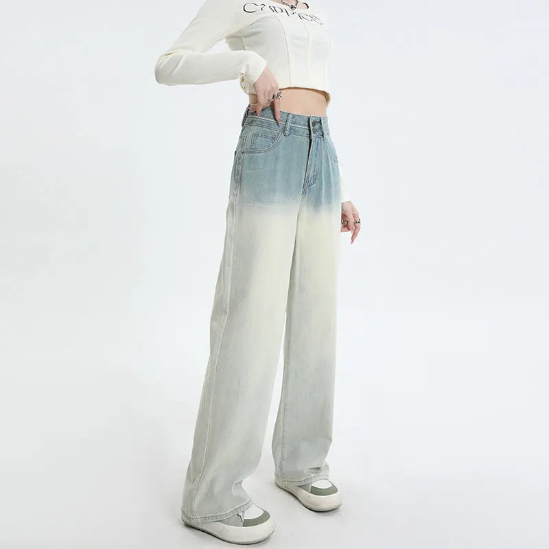Women's gradient blue cotton denim wide-leg straight trousers on a hanger.