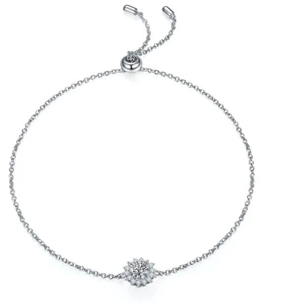 925 silver three piece jewellery set with moissanite pendant, stud earrings, and bracelet on white background