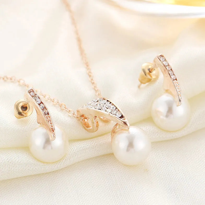 Diamond crystal pearl necklace and earring set on display, formal wedding jewellery