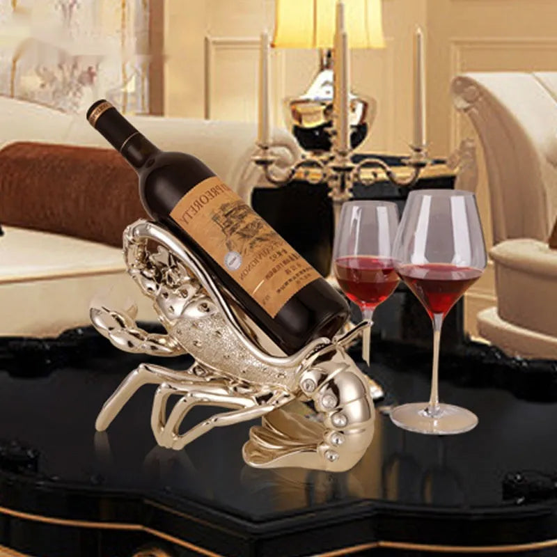 Lobster-shaped resin wine rack ornament in rose gold or silver, holding a wine bottle.