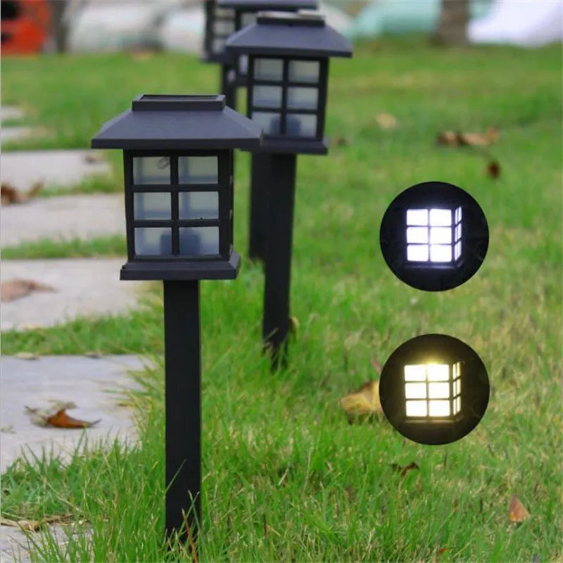 Solar square lawn light with LED, IP44, in a garden setting showing white light illumination
