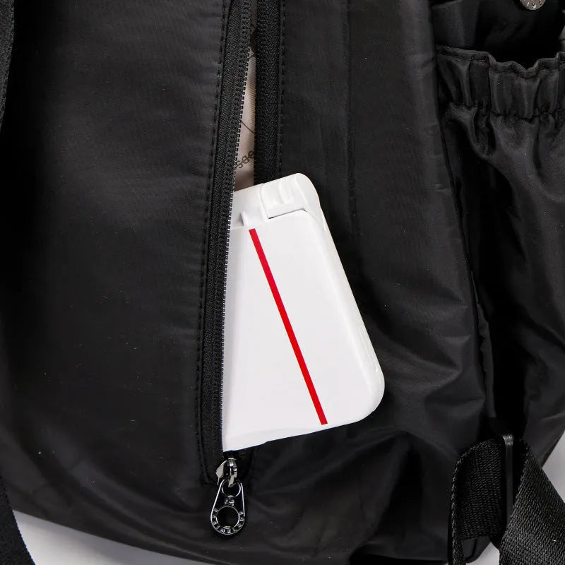 Outdoor backpack with large 48cm height, nylon construction, and sandwich pocket design in three colour options