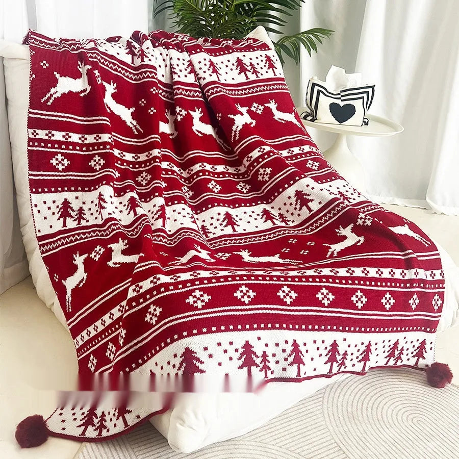 Christmas acrylic blanket showing snowflake or reindeer pattern in casual style