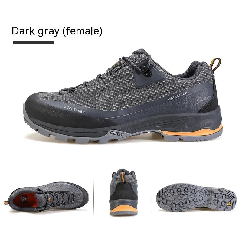 Men's low-top leather mesh hiking boots with front laces and a non-slip rubber outsole