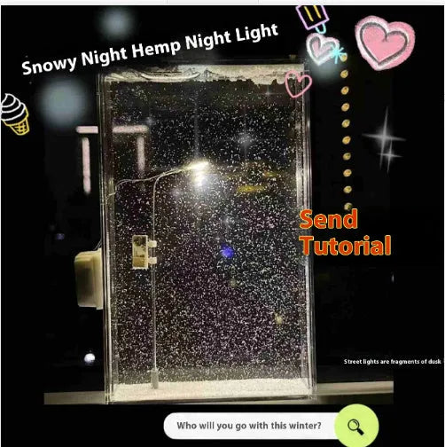 DIY snowy night light kit showing assembled snowflake street lamp scene with warm LED glow on a desktop.