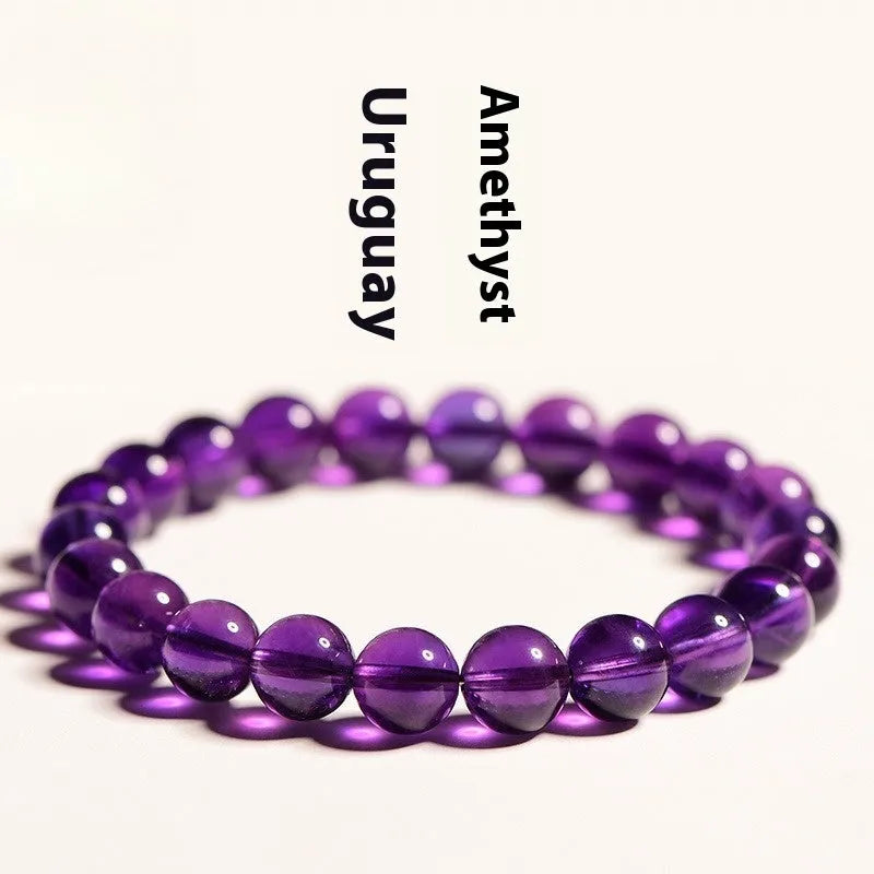 Natural amethyst Uruguay bracelet with scattered polished beads on a single ring.